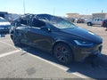2026 Tesla Model X — photo 1 of 16 | VIN 7SAXCBE67TF491416