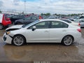 2014 Subaru Impreza — photo 14 of 16 | VIN JF1GJAH63EH006979