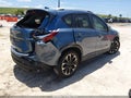 2016 Mazda CX-5 — photo 4 of 16 | VIN JM3KE2DYXG0721109