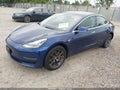 2019 Tesla Model 3 — photo 2 of 15 | VIN 5YJ3E1EA8KF299649