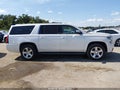 2016 Chevrolet Suburban — photo 13 of 16 | VIN 1GNSCHKC4GR166363