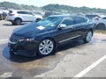 2017 Chevrolet Impala — photo 2 of 16 | VIN 1G1145S38HU165949