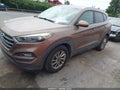 2016 Hyundai Tucson — photo 2 of 15 | VIN KM8J33A45GU158461