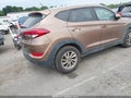 2016 Hyundai Tucson — photo 4 of 15 | VIN KM8J33A45GU158461