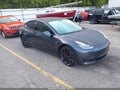 2020 Tesla Model 3 — photo 1 of 18 | VIN 5YJ3E1ECXLF603390