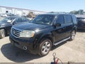 2013 Honda Pilot — photo 2 of 16 | VIN 5FNYF4H64DB015688