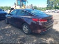 2016 Kia Optima — photo 3 of 10 | VIN 5XXGT4L36GG026047