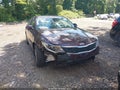 2016 Kia Optima — photo 6 of 10 | VIN 5XXGT4L36GG026047