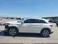 2021 Infiniti QX50 — photo 15 of 18 | VIN 3PCAJ5CA3MF111491