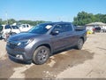 2020 Honda Ridgeline — photo 2 of 16 | VIN 5FPYK3F77LB004031