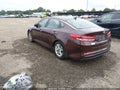2016 Kia Optima — photo 3 of 17 | VIN 5XXGT4L38GG109771