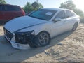 2021 Hyundai Sonata — photo 2 of 16 | VIN 5NPEG4JAXMH075829