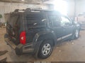 2011 Nissan Xterra — photo 4 of 16 | VIN 5N1AN0NW2BC502671