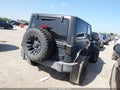 2018 Jeep Wrangler — photo 4 of 16 | VIN 1C4GJWAG8JL812172