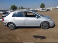 2009 Nissan Versa — photo 14 of 17 | VIN 3N1BC11E89L383642