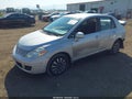 2009 Nissan Versa — photo 2 of 17 | VIN 3N1BC11E89L383642