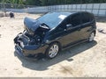 2009 Honda Fit — photo 2 of 22 | VIN JHMGE88429S010860