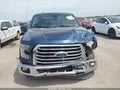 2015 Ford F-150 — photo 12 of 16 | VIN 1FTEW1CF5FKD04464