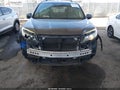 2017 Honda Pilot — photo 13 of 17 | VIN 5FNYF5H90HB023180