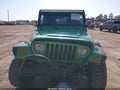 2005 Jeep Wrangler — photo 12 of 16 | VIN 1J4FA39S65P323720