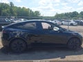 2025 Tesla Model Y — photo 14 of 19 | VIN 7SAYGDEE6SA340557