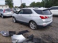 2018 Chevrolet Equinox — photo 3 of 17 | VIN 2GNAXNEX8J6232655