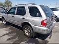 2004 Isuzu Rodeo — photo 3 of 11 | VIN 4S2CK58Y244311916