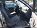 2004 Isuzu Rodeo — photo 5 of 11 | VIN 4S2CK58Y244311916