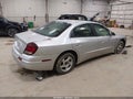 2002 Oldsmobile Aurora — photo 4 of 16 | VIN 1G3GR64H124169513