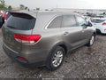 2016 Kia Sorento — photo 4 of 11 | VIN 5XYPG4A39GG059725