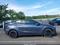 2023 Tesla Model Y — photo 12 of 15 | VIN 7SAYGAEE4PF827720