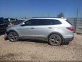 2016 Hyundai Santa Fe — photo 14 of 16 | VIN KM8SR4HF9GU133580
