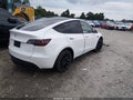 2021 Tesla Model Y — photo 4 of 19 | VIN 5YJYGDEE7MF264804