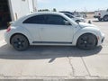 2014 Volkswagen Beetle — photo 12 of 15 | VIN 3VWVT7AT7EM666448