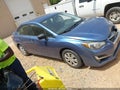 2015 Subaru Impreza — photo 13 of 16 | VIN JF1GJAA68FH023756