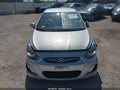 2014 Hyundai Accent — photo 12 of 16 | VIN KMHCT4AE2EU590591