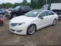 2016 Lincoln MKZ — photo 2 of 17 | VIN 3LN6L2JK0GR604117