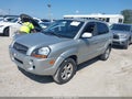 2009 Hyundai Tucson — photo 2 of 11 | VIN KM8JN12B59U128388