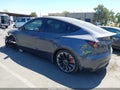 2023 Tesla Model Y — photo 3 of 20 | VIN 7SAYGDEF9PF738185