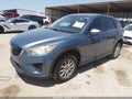 2014 Mazda CX-5 — photo 2 of 16 | VIN JM3KE2BE8E0402846