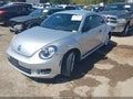 2013 Volkswagen Beetle — photo 2 of 18 | VIN 3VWFP7AT3DM631512