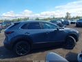 2024 Mazda CX-30 — photo 13 of 16 | VIN 3MVDMBCM2RM641384