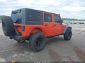 2015 Jeep Wrangler Unlimited — photo 4 of 17 | VIN 1C4BJWFGXFL676329
