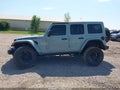 2023 Jeep Wrangler — photo 14 of 16 | VIN 1C4HJXFG8PW542841