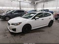 2019 Subaru Impreza — photo 2 of 16 | VIN 4S3GTAM65K3725881
