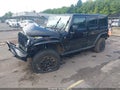 2016 Jeep Wrangler Unlimited — photo 2 of 16 | VIN 1C4HJWDG6GL345407