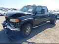 2006 GMC Sierra — photo 2 of 15 | VIN 1GTJK33DX6F180656