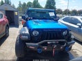 2023 Jeep Wrangler — photo 12 of 16 | VIN 1C4HJXDG2PW641013