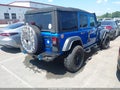 2023 Jeep Wrangler — photo 4 of 16 | VIN 1C4HJXDG2PW641013
