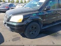 2004 Honda Pilot — photo 12 of 12 | VIN 2HKYF18634H600083